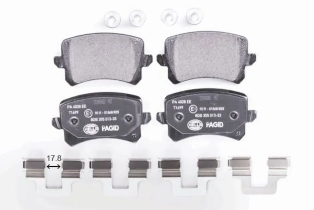 355025331 – HELLA Brake Pad, Low-Metallic Set Of 2 With Mounting Hardware